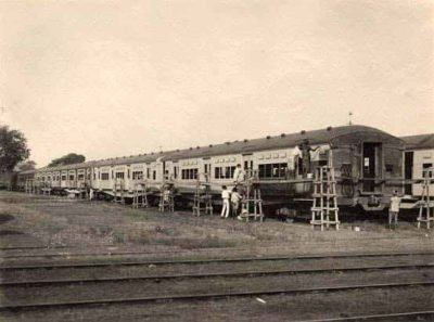 Painting the new electric coaching stock in the carriage shops at Parel during December 1927.